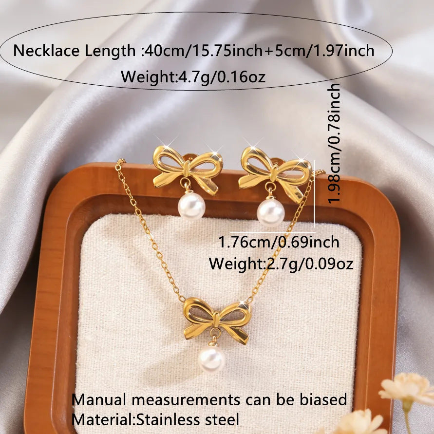 Elegante parure collana e orecchini in acciaio inossidabile con fiocco e perle, con catena a maglie forzatine