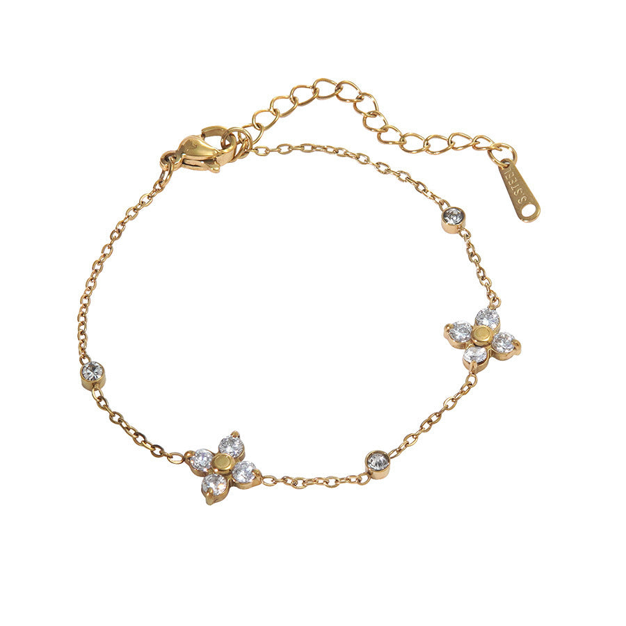 Elegante bracciale da donna in acciaio inossidabile placcato oro 18 carati, con strass e design floreale geometrico