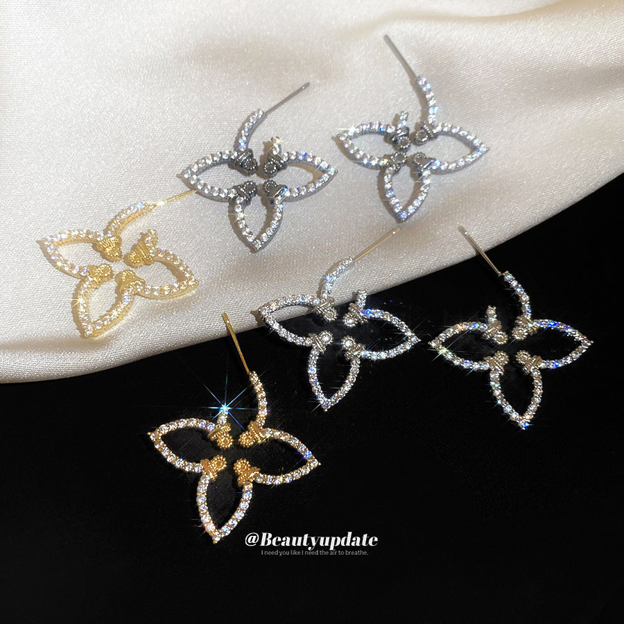 Pendientes florales minimalistas con incrustaciones de circonita en postes de acero inoxidable para mujer