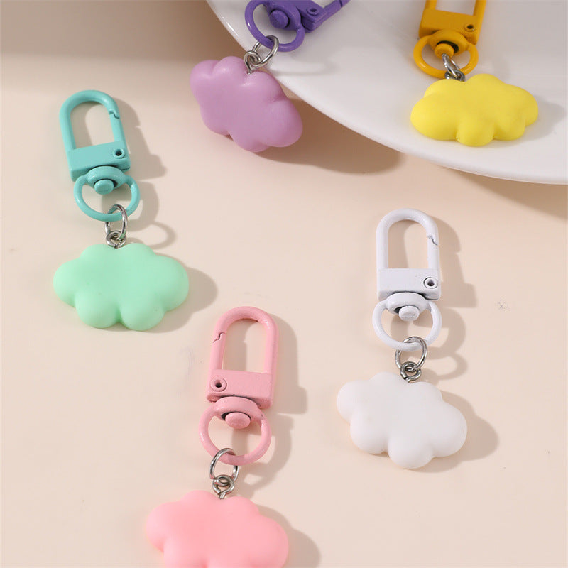 Lindo llavero giratorio de metal con nudo de nube de flor de macaron de dibujos animados para regalos de graduación y cumpleaños de profesores