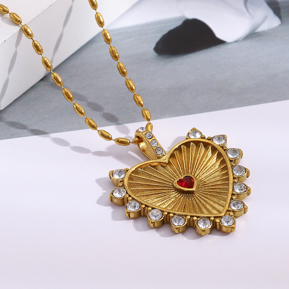 Collar con colgante minimalista de acero inoxidable en forma de corazón para mujer con baño de oro de 18K y elegante grabado