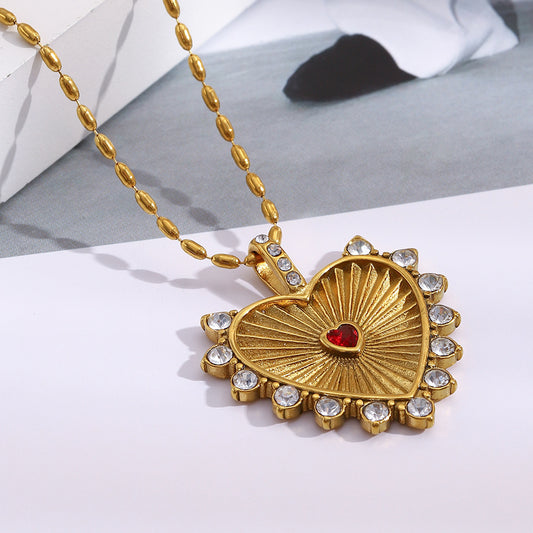 Collar con colgante minimalista de acero inoxidable en forma de corazón para mujer con baño de oro de 18K y elegante grabado