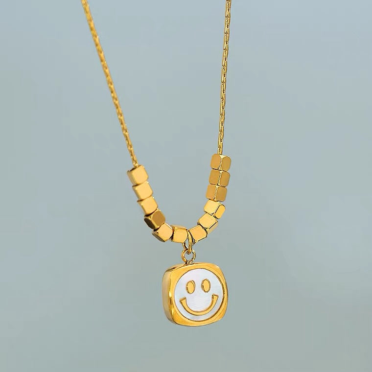 Artistic Minimalist Geometric Shell Smile Pendant Necklace for Women in Titanium Steel with Plated Finish Adjustable Clavicle Chain