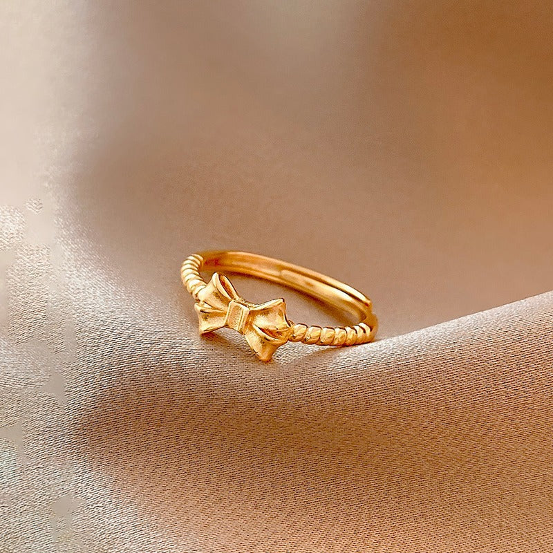 Anello Minimalista Regolabile con Fiocco da Donna in Acciaio al Titanio con Finitura Galvanizzata