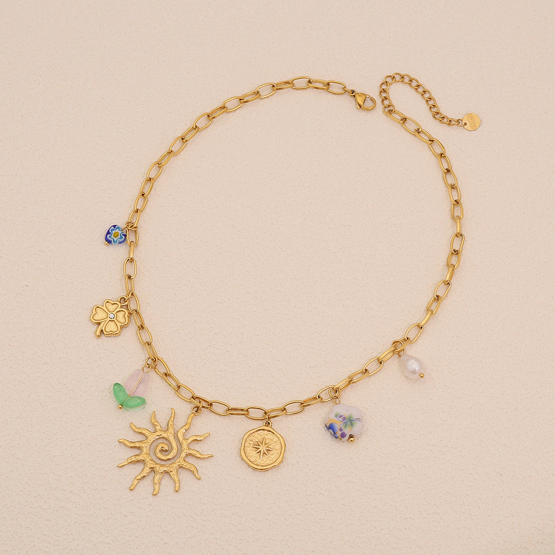 Collana in acciaio inossidabile placcato a forma di foglia, stile OL alla moda, con ciondolo a forma di girasole e perla, per donna
