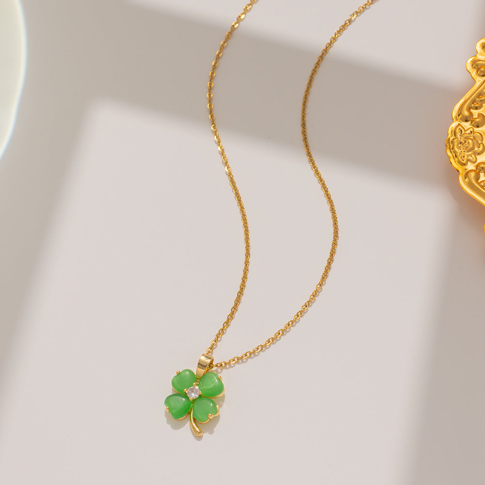 Collana con pendente di lusso minimalista a quadrifoglio da donna in acciaio al titanio con intarsio in oro su catena a perline