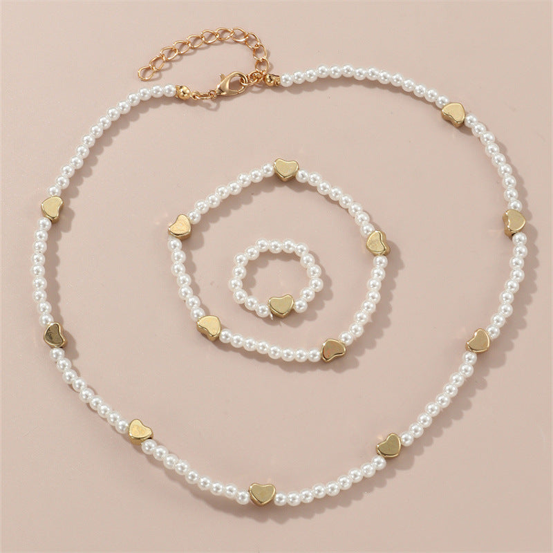 Bonito conjunto de collar hecho a mano de resina con forma de corazón para niños con diseño de cuentas y cadena de cuentas redondas