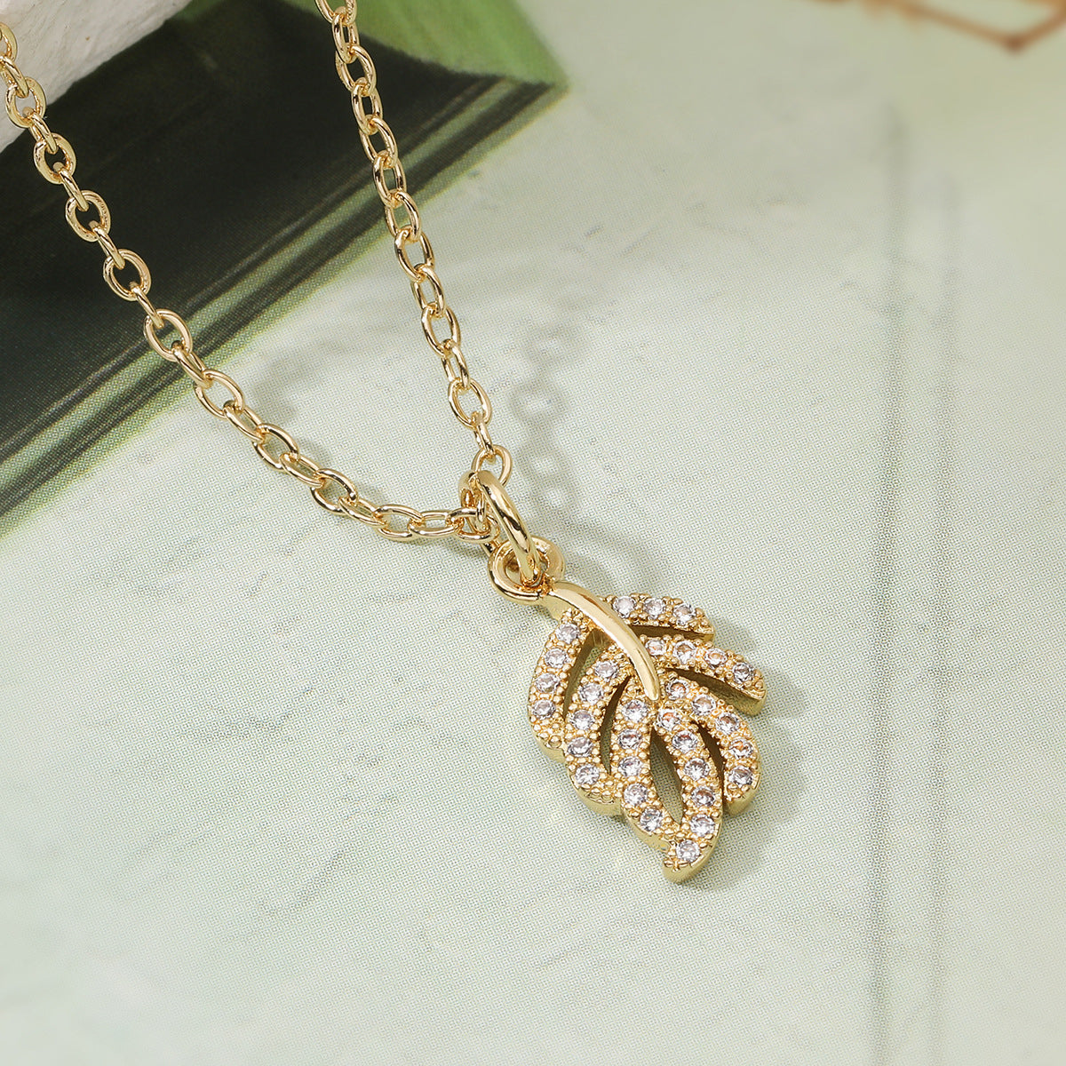 Minimalist Luxury Gold Plated Brass Geometric Feather Leaf Cubic Zirconia Pendant Necklace for Women