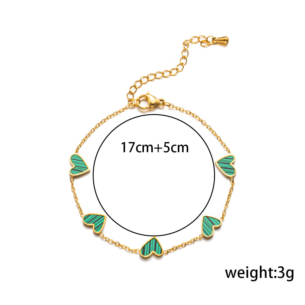 Pulsera minimalista de lujo ligero con forma de corazón de acero de titanio con PVD y oro blanco de 18 quilates y nácar para mujer