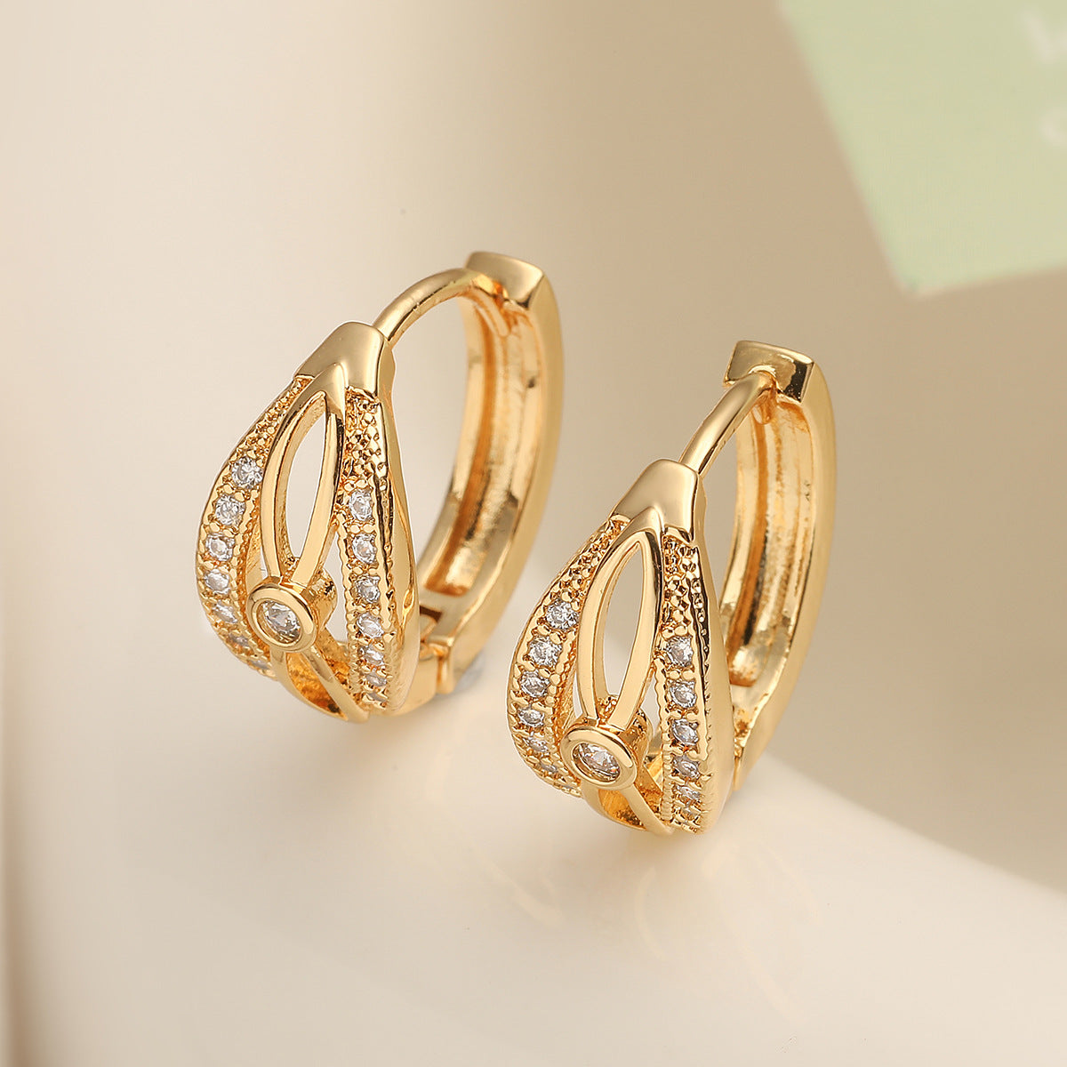 Geometric Hollow-Out Fashion Earrings for Women in Copper with Real Gold Plating and Zircon Inlay
