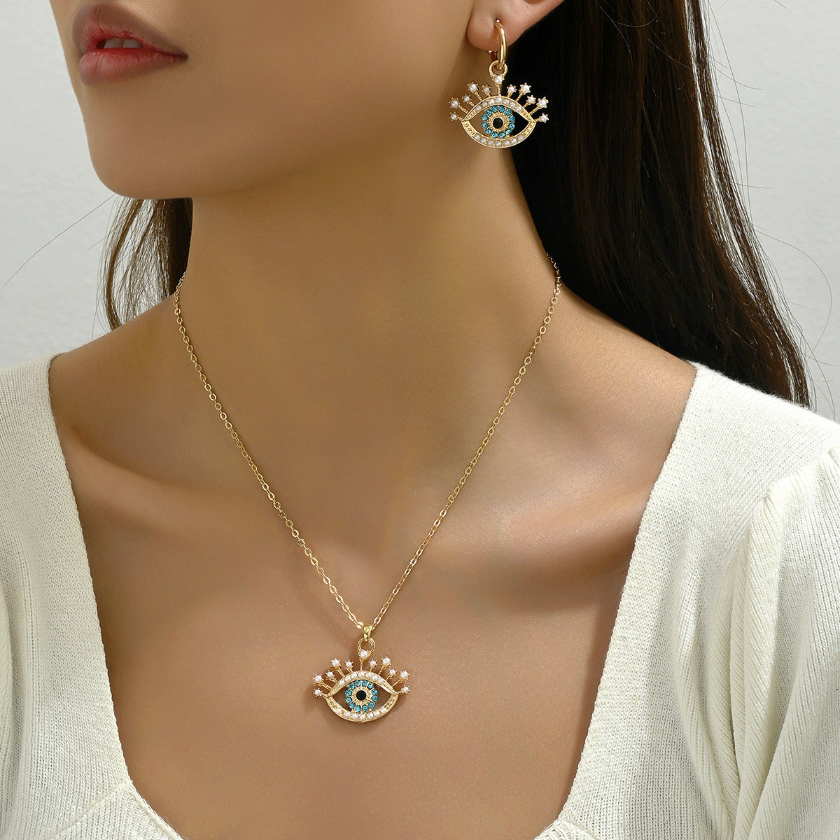 Conjunto de collar con colgante de ojo turco minimalista y pendientes de botón para mujer, de aleación con incrustaciones de diamantes de imitación
