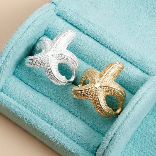 Anello da donna alla moda a forma di stella marina in metallo con finitura placcata per le vacanze al mare
