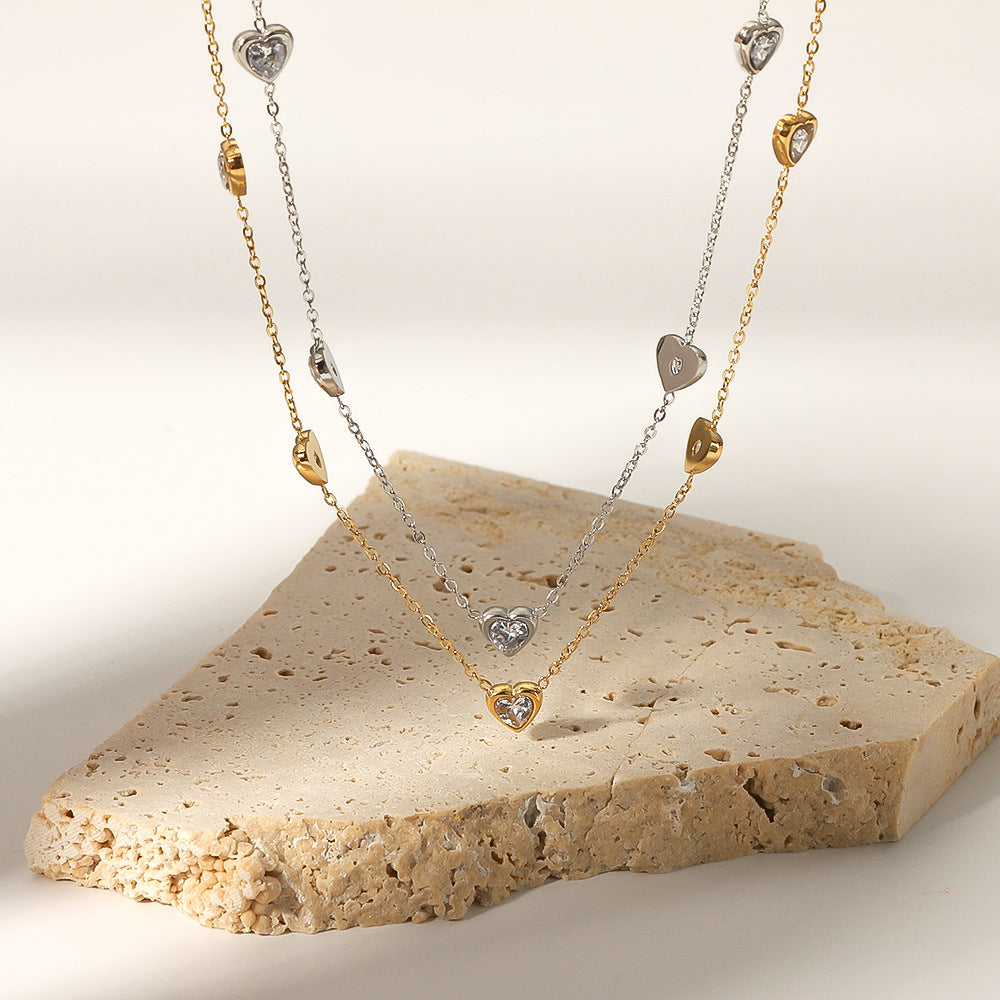 Collana da donna in acciaio inossidabile a forma di cuore stile INS con ciondolo in acciaio al titanio placcato oro 18 carati e intarsio in zirconi