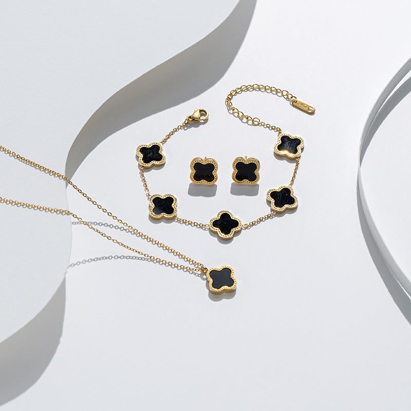 Set collana con pendente in acciaio al titanio a forma di quadrifoglio alla moda con catena a maglie per donna