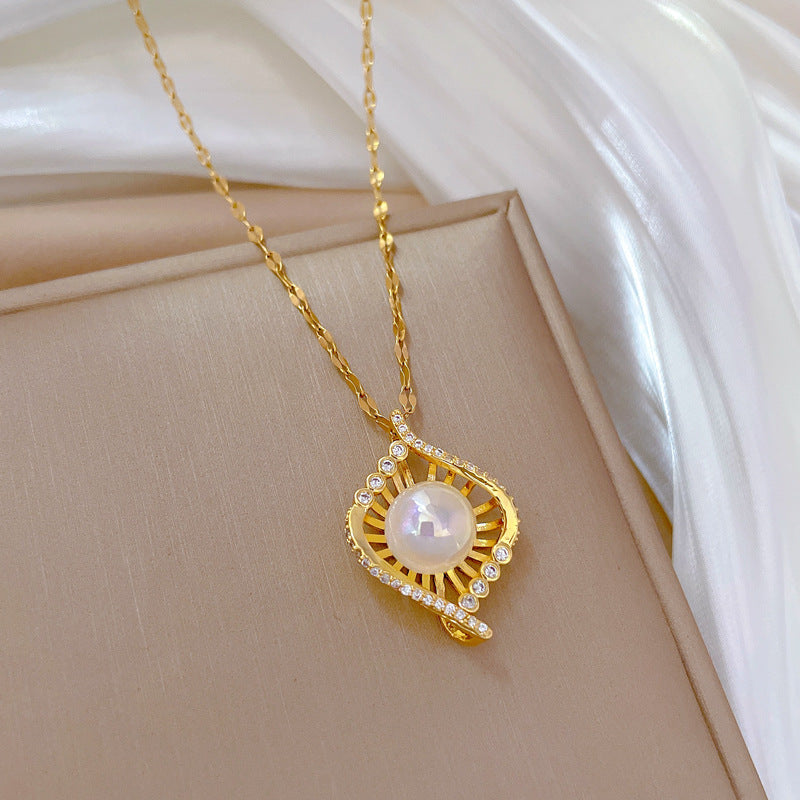 Collana con ciondolo nido di sirena geometrico minimalista da donna con catena in acciaio al titanio e strass