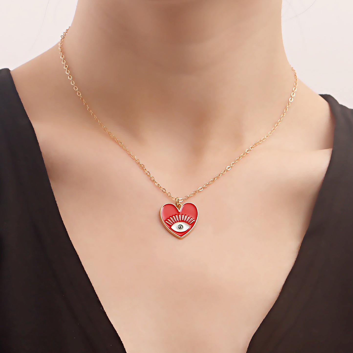Minimalist Evil Eye Pendant Necklace for Women with Alloy Heart Charm and Geometric Design on Clavicle Chain