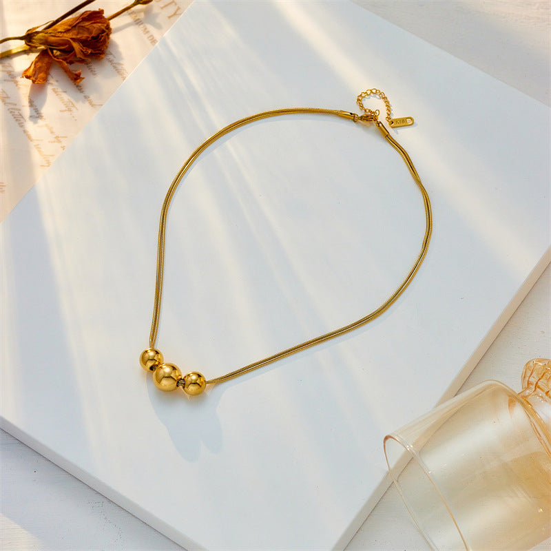 Collar minimalista de acero de titanio con cuentas redondas irregulares y acabado chapado para mujer