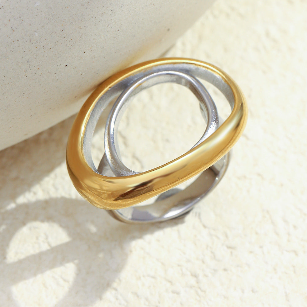 Anillo de acero inoxidable geométrico minimalista con chapado en oro de 18 quilates para mujer, banda ovalada de dos tonos