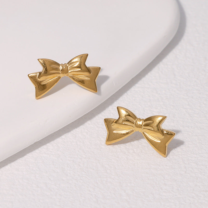 Pendientes de acero inoxidable en forma de lazo de moda minimalista con baño de oro para mujer