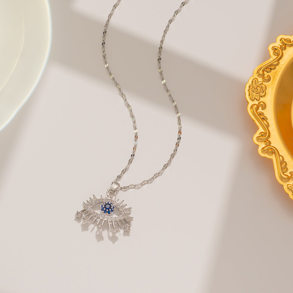 Collana con pendente a occhio in zircone micropavé in acciaio al titanio, minimalista e leggera, da donna con catena a onda