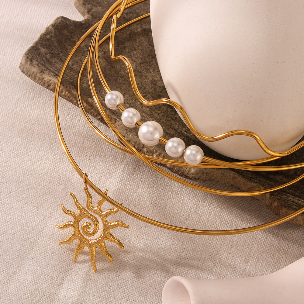 Minimalist Wave-Shaped Sunflower Bowknot Pearl Pendant Necklace in Stainless Steel with 18K Gold Plating for Women