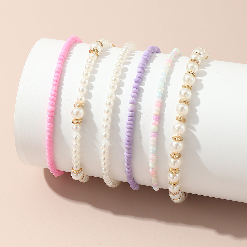 Set de pulseras de cuentas de cristal geométricas minimalistas para niñas en colores pastel rosa y morado