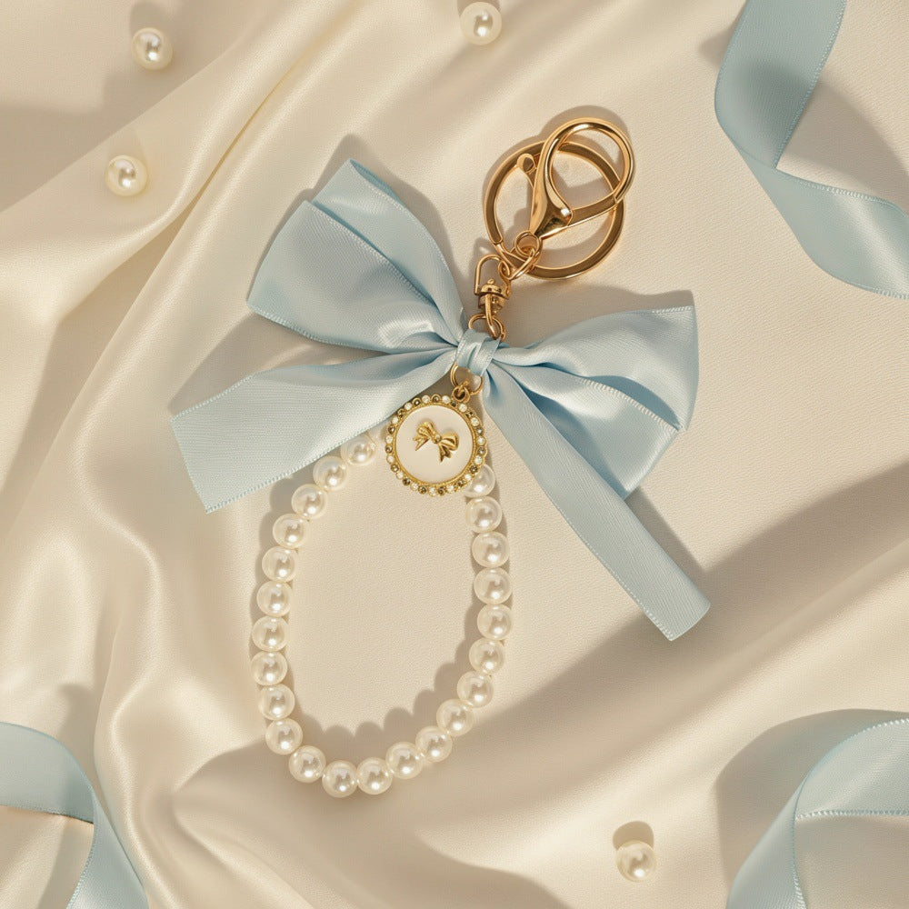Sweet Cartoon Bow Pearl Zinc Alloy Keychain Bag Charm