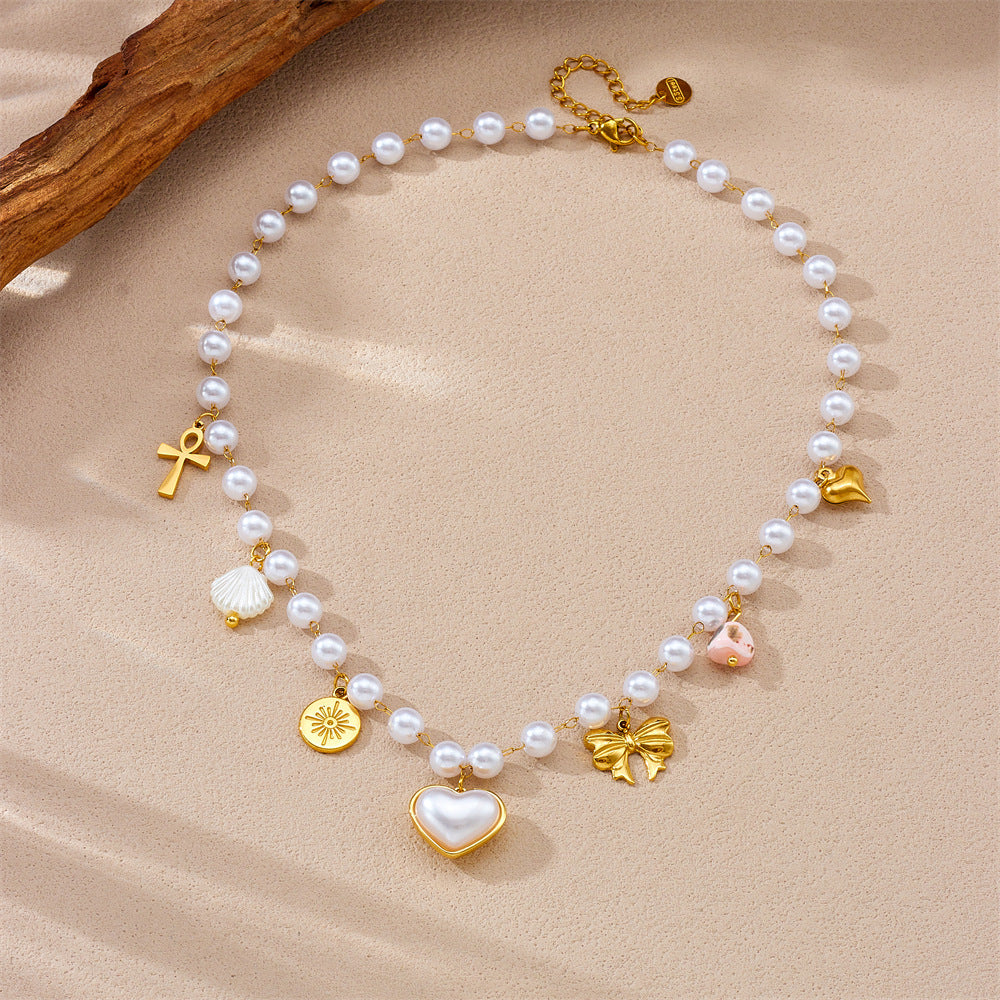 Fashionable Heart and Bow Pendant Necklace in Stainless Steel with Plated Finish for Women