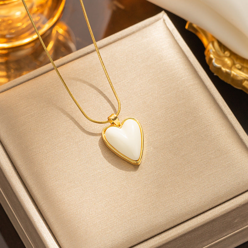 Collar con colgante minimalista de nudo de lazo de acero de titanio para mujer con cadena de serpiente chapada