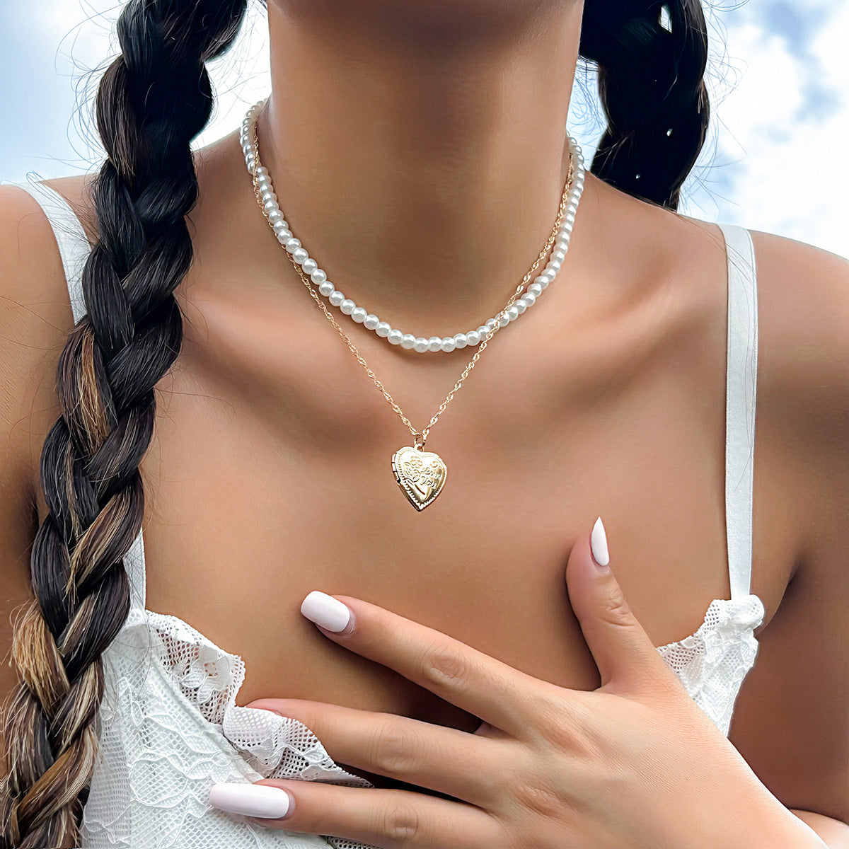 Collana con pendente a cuore dolce e audace da donna in lega con finitura galvanica su catena di perle