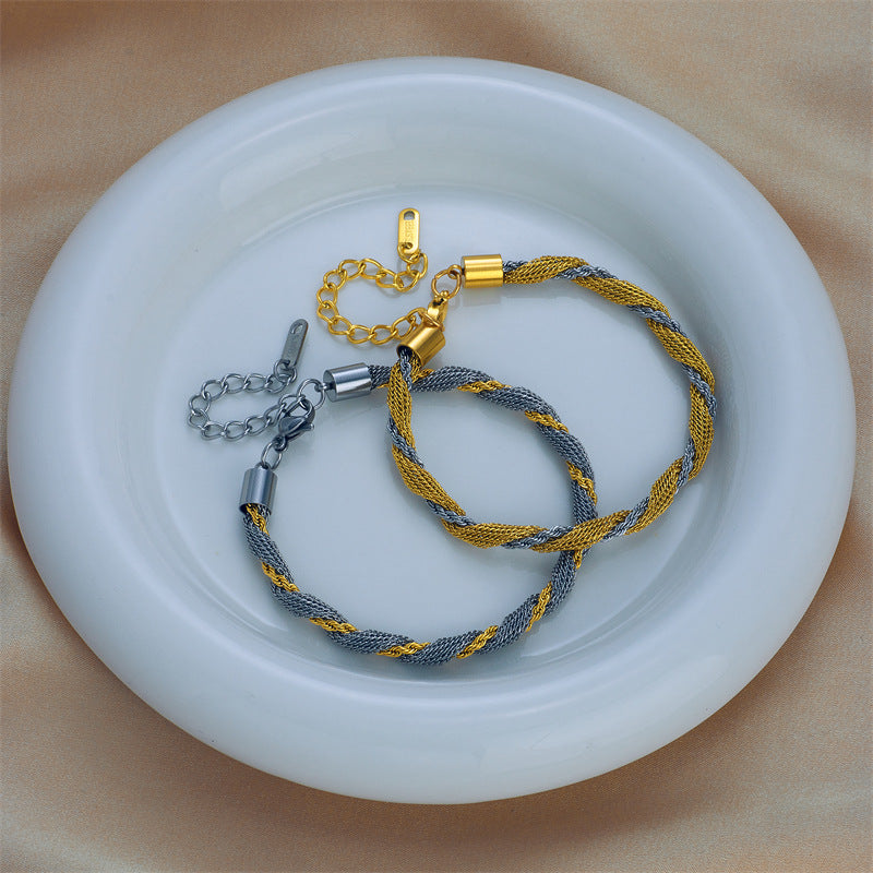 Minimalist Titanium Steel Twisted Dual-Tone Hollow Circle Bracelet for Men and Women