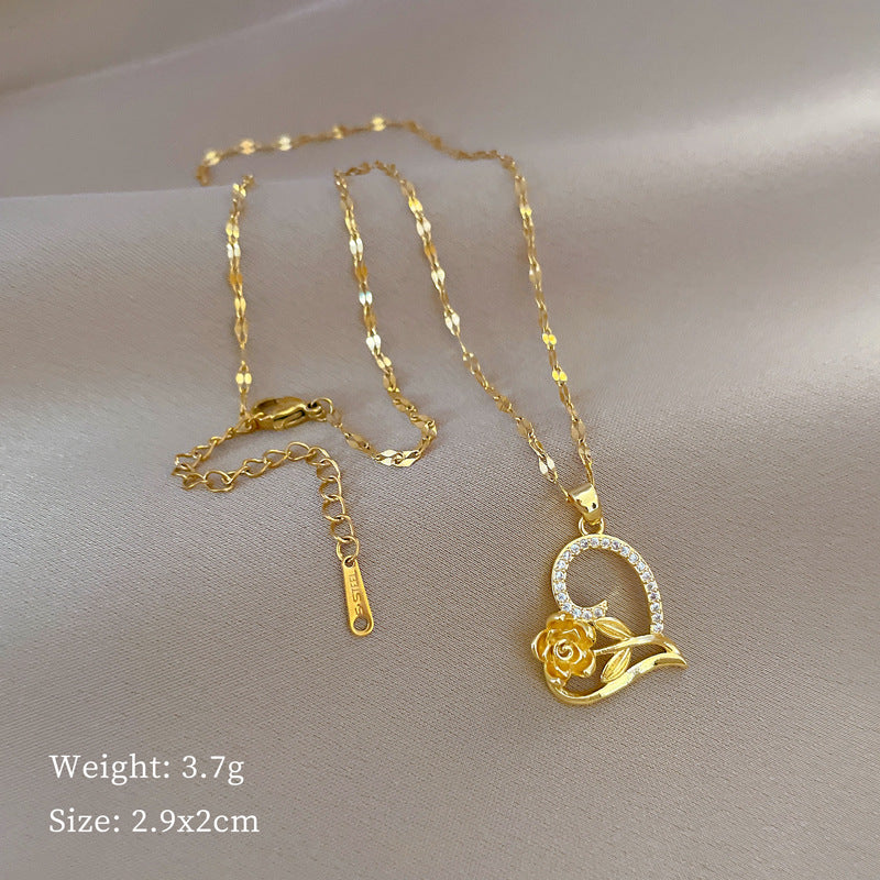 Collar con colgante de lujo elegante de circonitas con forma de corazón rosa, cadena de acero titanio para mujer y hombre