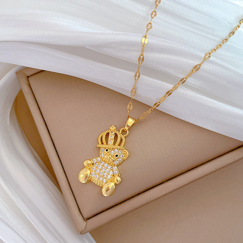 Collar con colgante de oso minimalista con diseño de corona de circonitas en acero de titanio para mujer y hombre