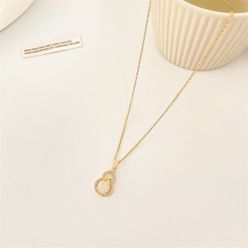 Minimalist White Calabash Pendant Necklace in Titanium Steel with Rhinestone Inlay on O-Chain for Women