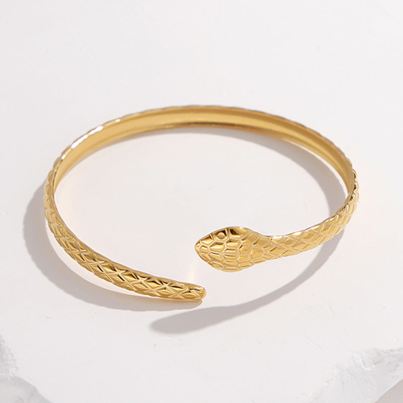 Pulsera ajustable de acero titanio con forma de serpiente para mujer, con acabado chapado, brazalete de metal estilo C a la moda