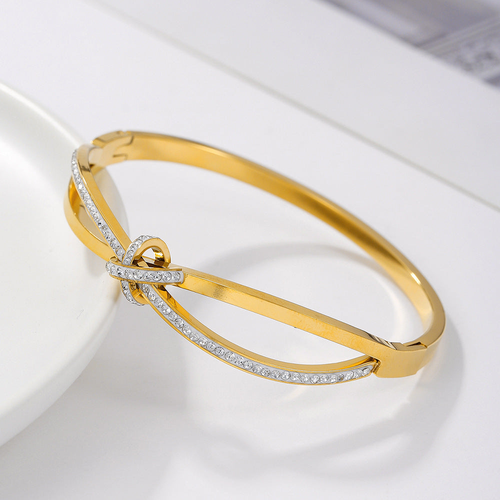 Minimalist Geometric Titanium Steel Paved Cubic Zirconia Bow Bracelet