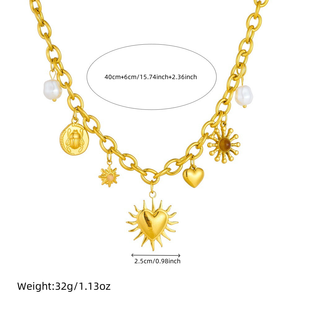 Collana vintage con ciondolo a forma di sole e cuore con motivi di perle e insetti in acciaio inossidabile placcato oro su catena a maglie ovali