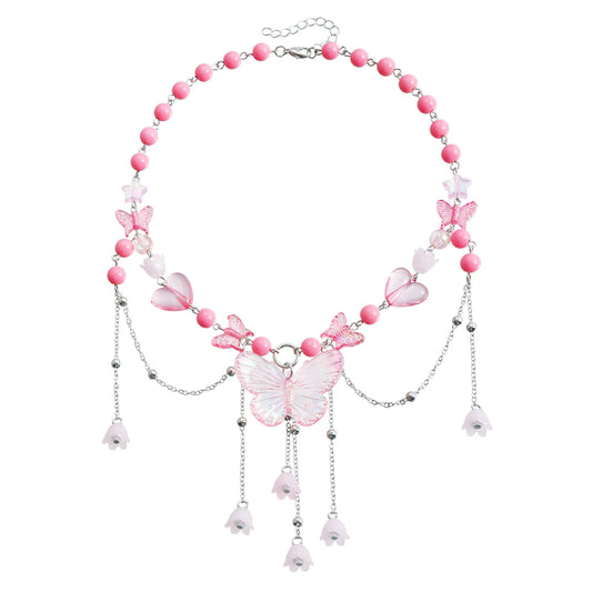 Collana pendente a cuore e farfalla in stile Y2K con perle finte e nappe su catena di perline in resina da donna