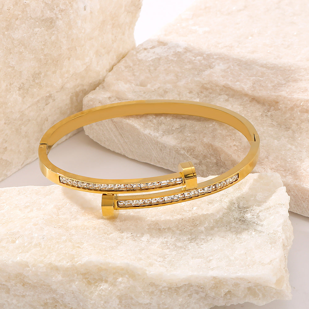 Asymmetrical Titanium Steel Bracelet with 18K Gold Plating and Zircon Inlay, Open-Disc Design for Women