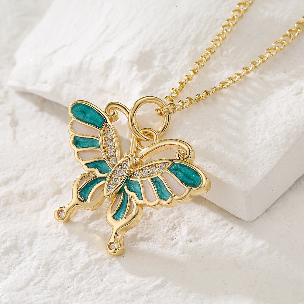 Minimalist Butterfly Pendant Necklace for Women with Copper Base Plated in 18K Gold and Enamel Finish Featuring Cubic Zirconia Accents