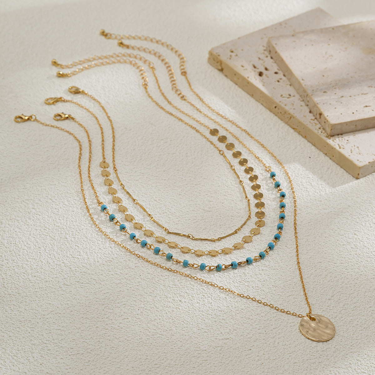 Collana Pendente Multistrato da Donna Fatta a Mano in Metallo Misto Stile Turchese Geometrico Minimalista con Frange e Catena Snake