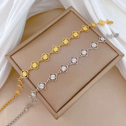 Minimalist Vintage Hollow Four-Leaf Flower Plant Design Polished Titanium Steel Bracelet for Women
