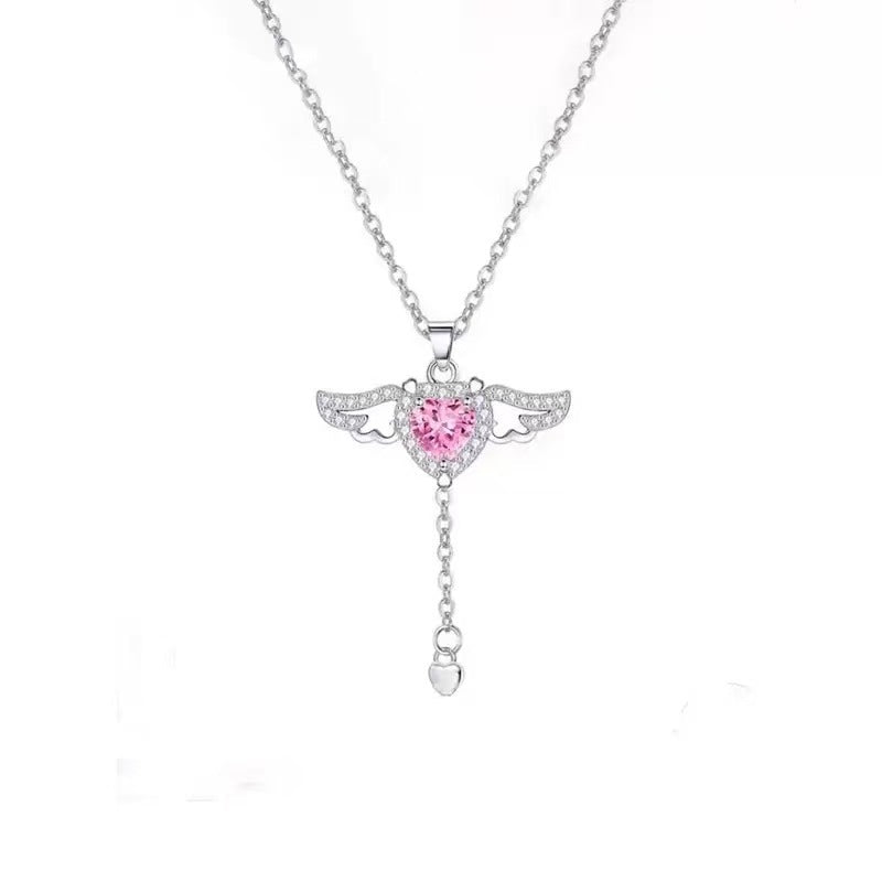 Collana Unisex con Pendente a Cuore Alato Movibile Minimalista di Lusso Leggero in Rame Geometrico con Zirconi e Catena a Croce in Acciaio al Titanio