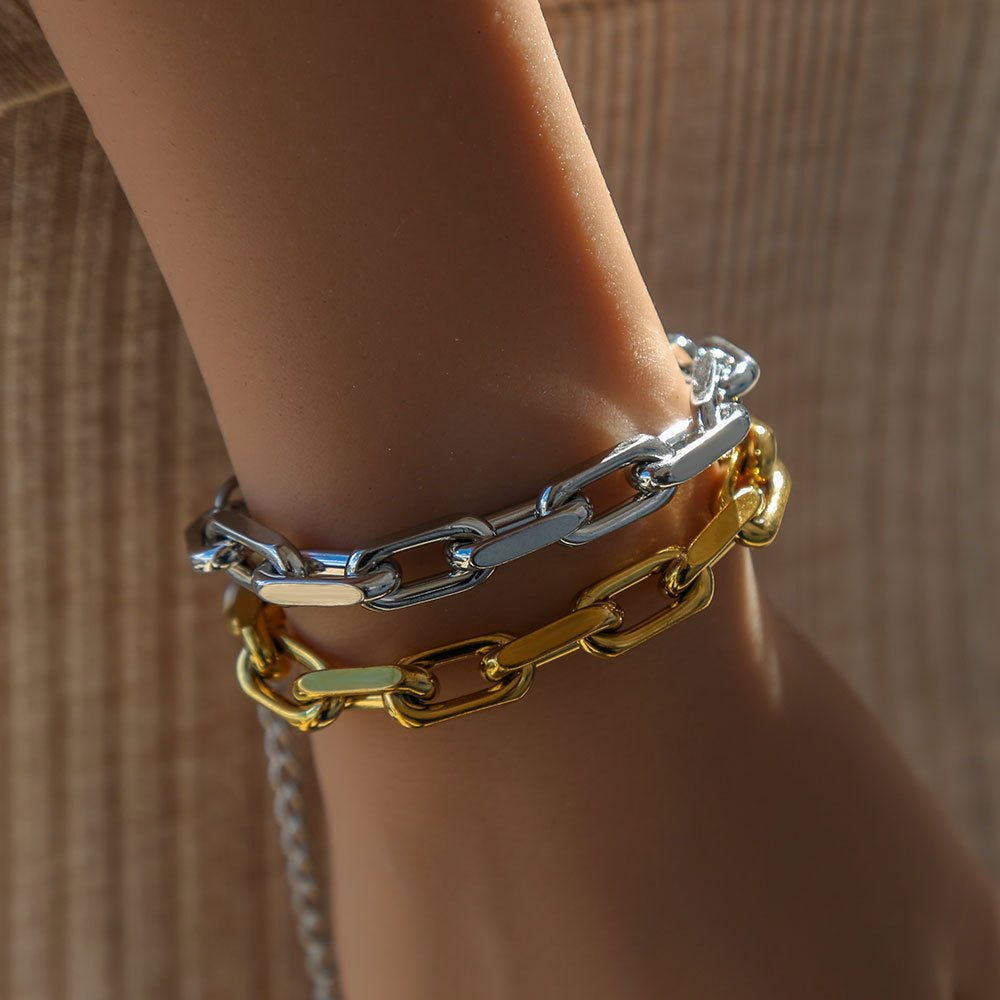 Pulsera unisex de acero inoxidable chapada en oro con diseño atrevido, estilo urbano y estética hip-hop