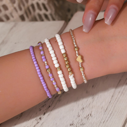 Pulsera bohemia multicapa de cuentas de corazón con cuentas de aleación y cordón elástico para mujer