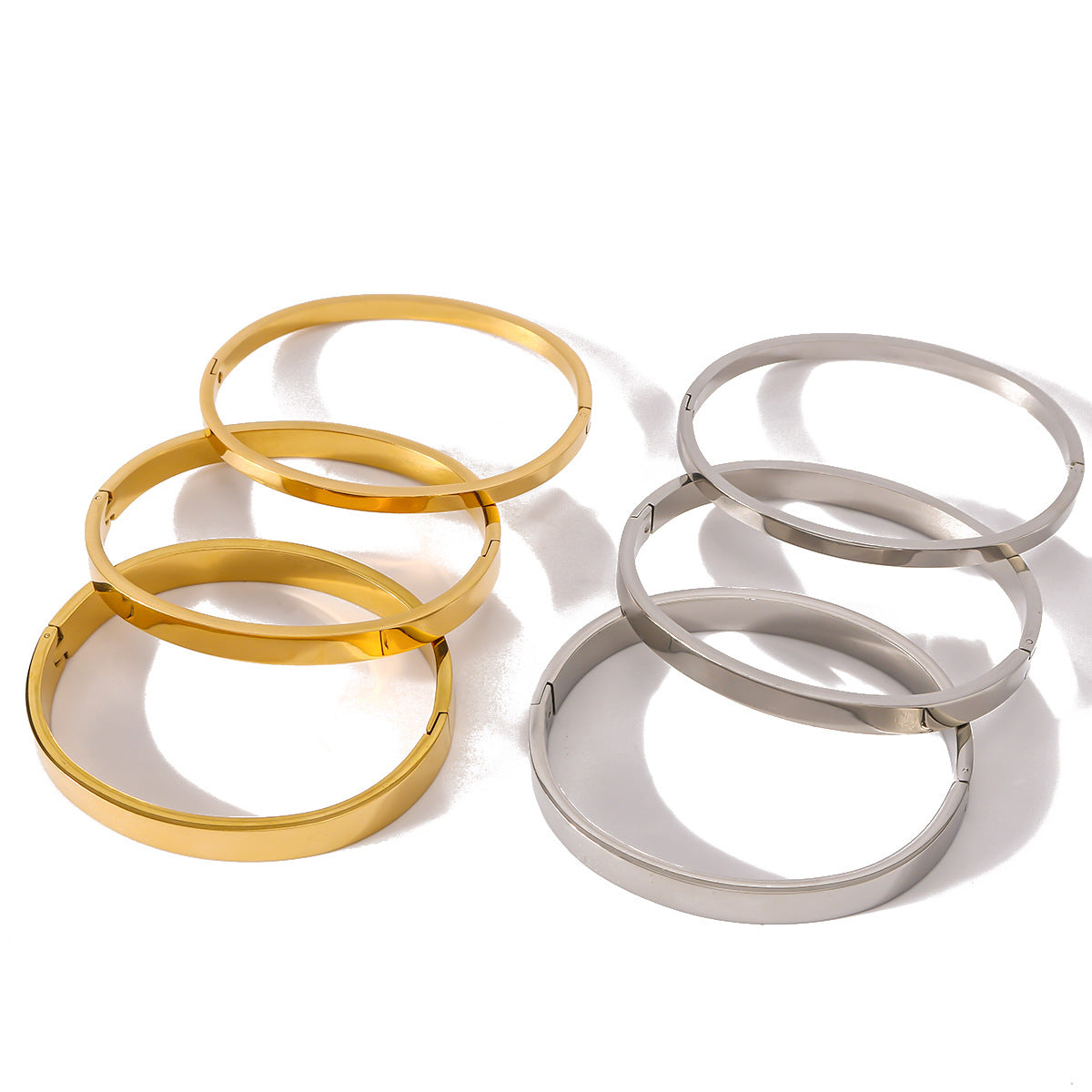 Minimalist Stainless Steel Bracelet with 18K Gold Plating Geometric Round Oval Ring Design for Women