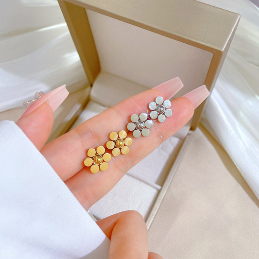 Minimalist Geometric Titanium Steel Stud Earrings with Plated Finish for Women Nature-Inspired Six-Leaf Flower Design