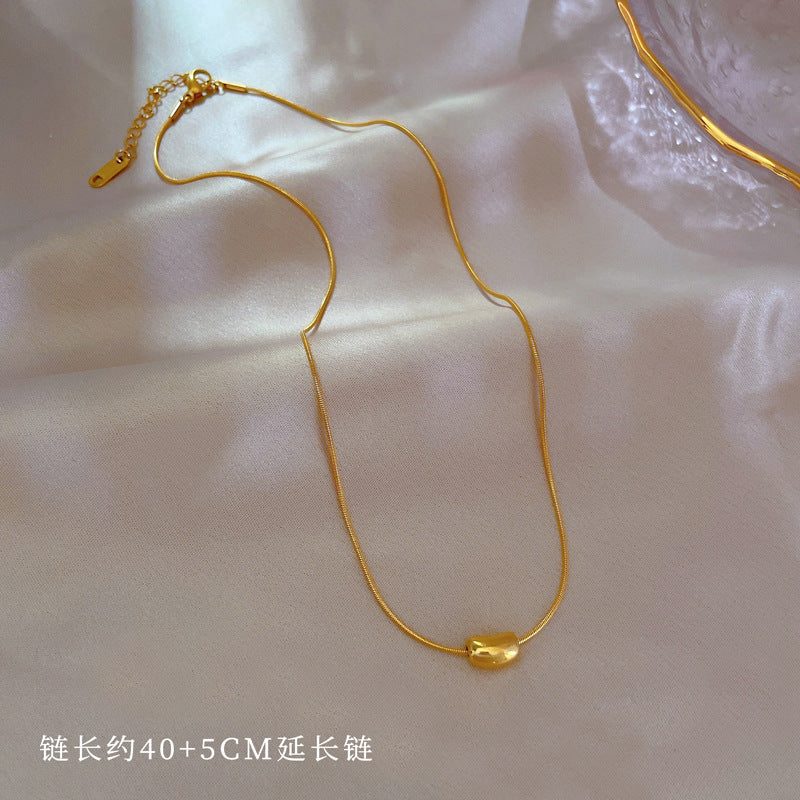 Cartoon Style Geometric Pendant Necklace for Women Made of Titanium Steel with Gold Plating, Clavicle Chain Design Featuring Red Bean Motif
