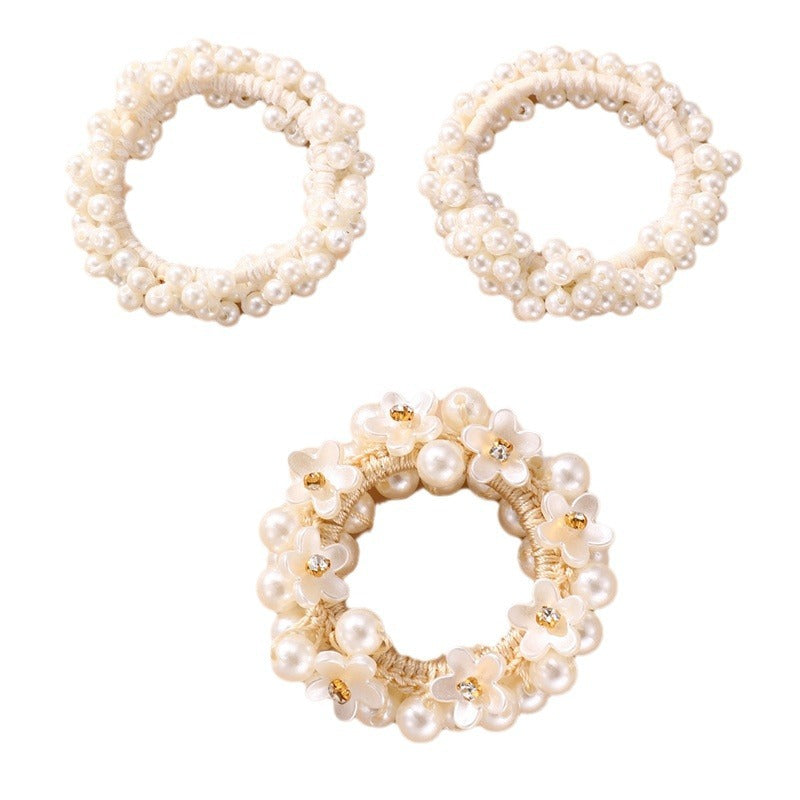 Juego de gomas de pelo florales minimalistas para niños con detalles de perlas y estructura de resina