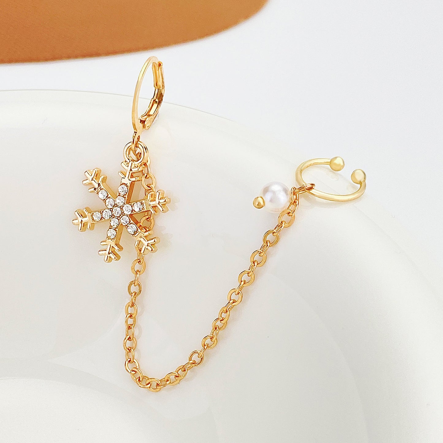 Orecchini con catena lunga ispirati a fiocchi di neve geometrici, con strass intarsiati in lega, da donna